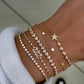 NEW! 14kt gold and diamond bezel row star bracelet