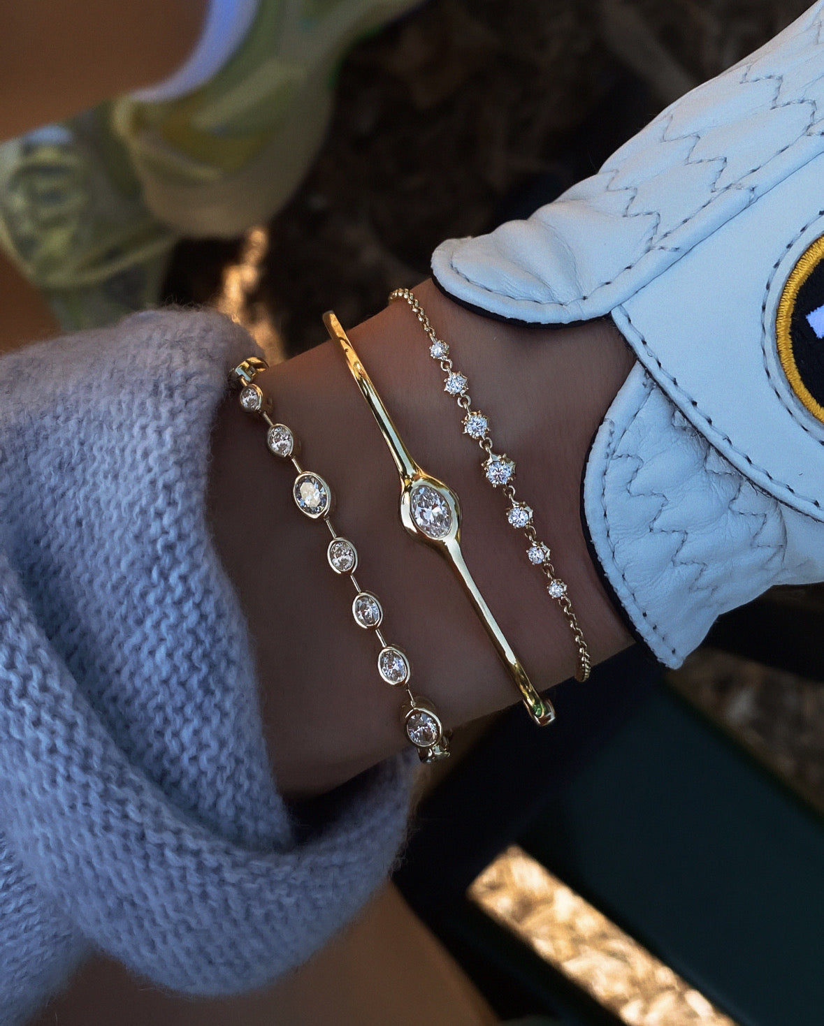14kt gold single diamond bezel orbit bangle