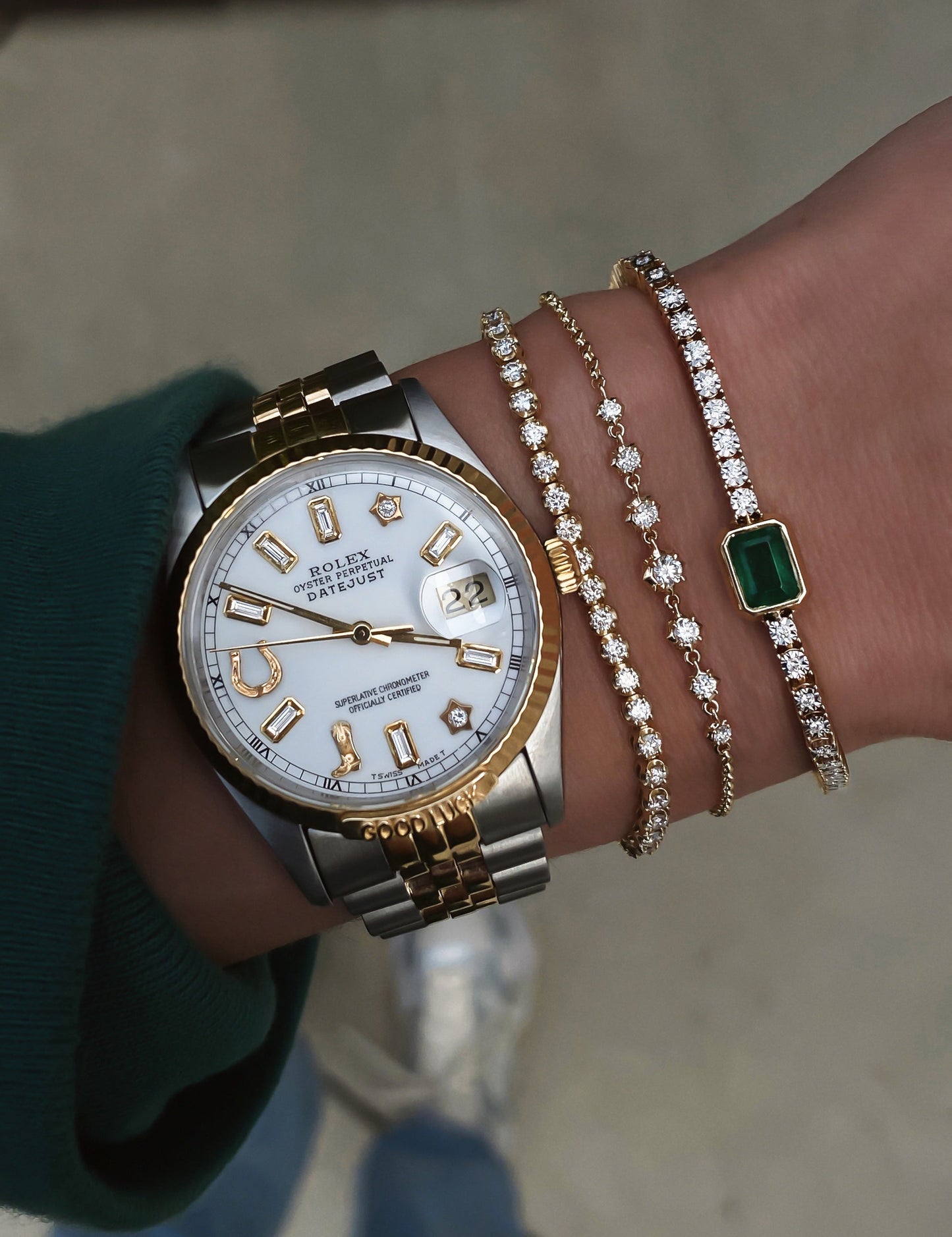 14kt gold grande emerald bezel diamond tennis bracelet