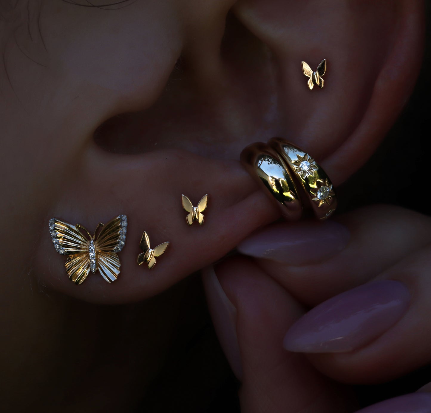 14kt gold and diamond butterfly burst studs
