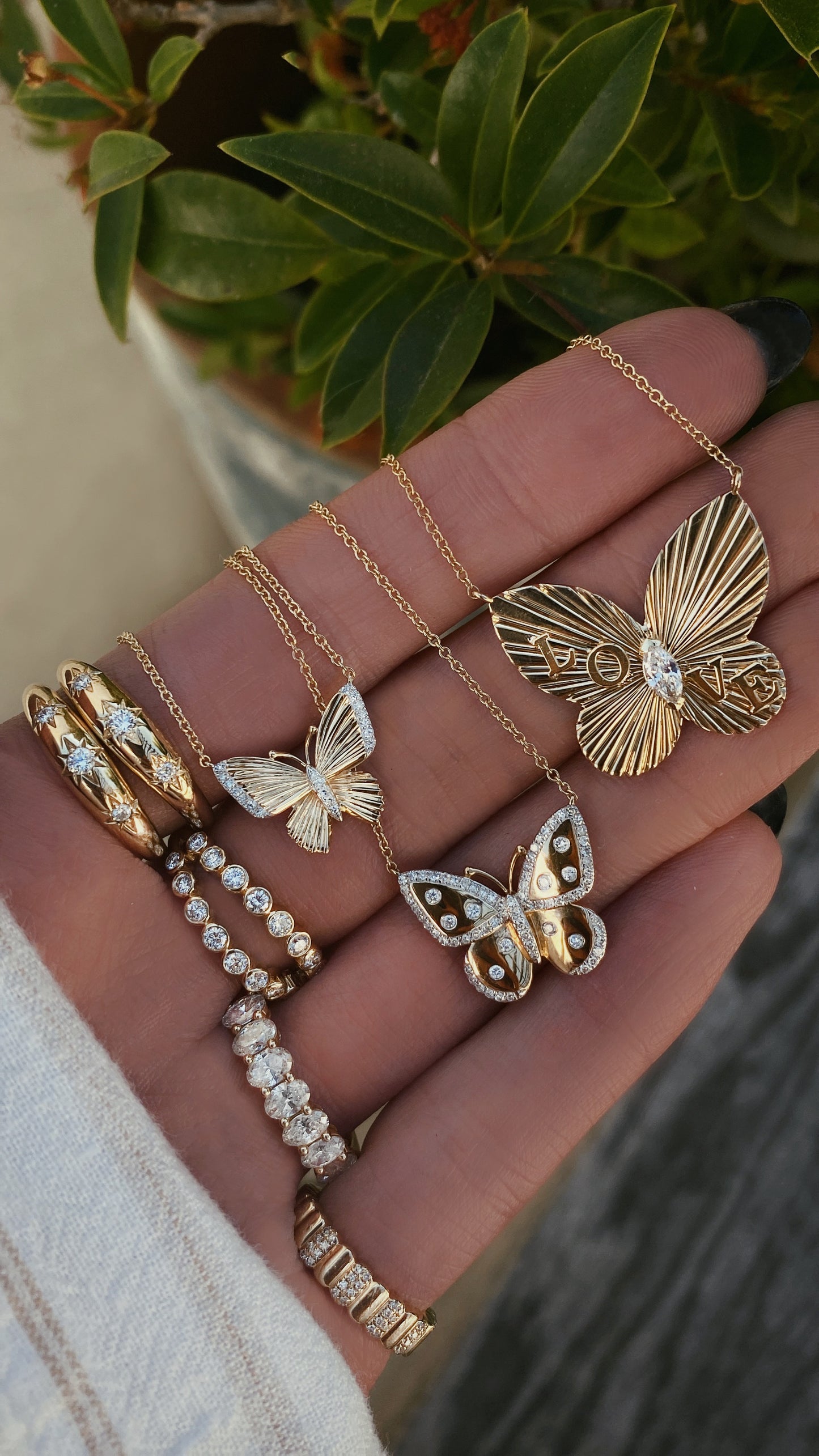 14kt gold two row diamond bezel open arch ring