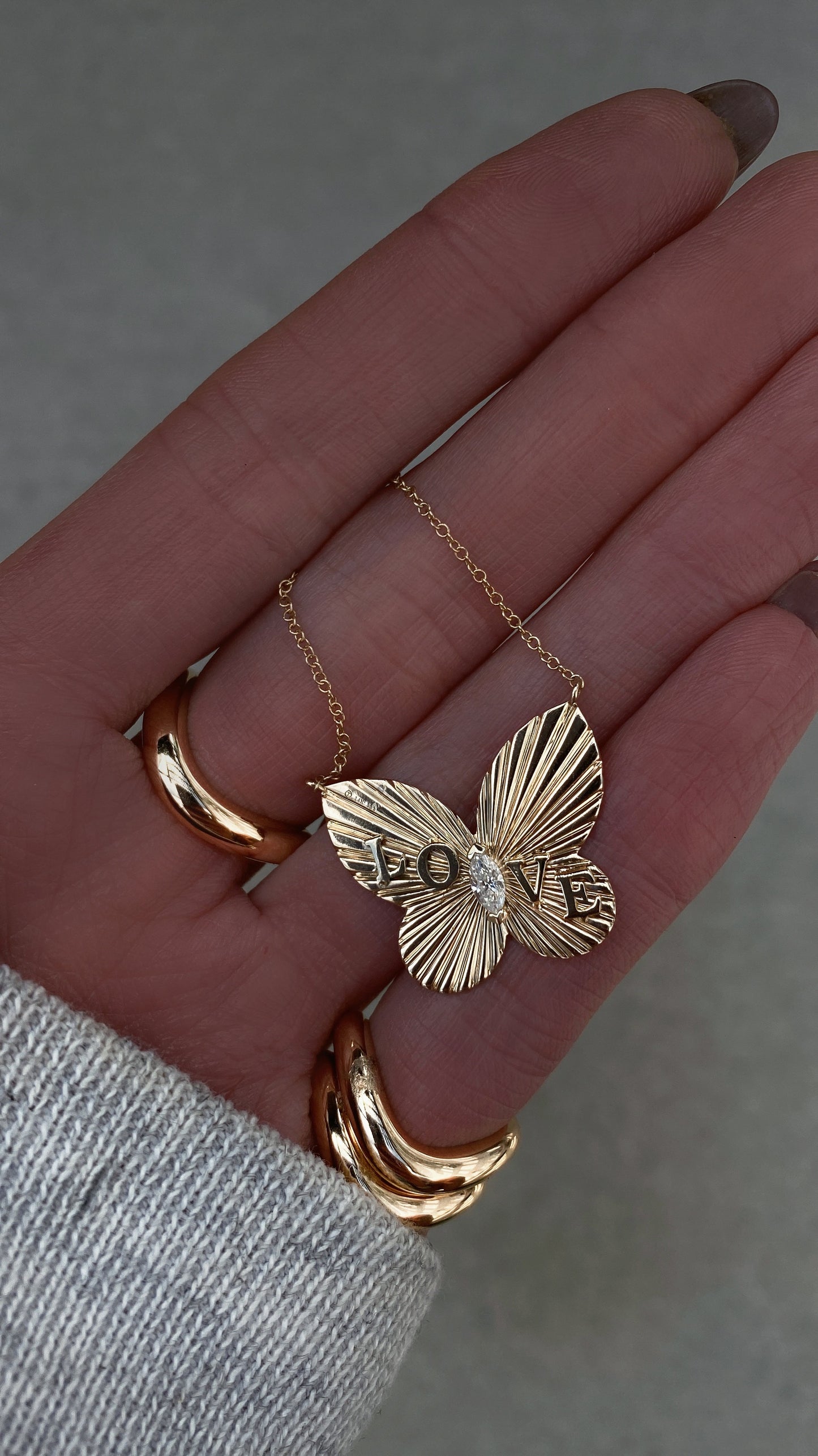 14kt gold and diamond butterfly burst love necklace