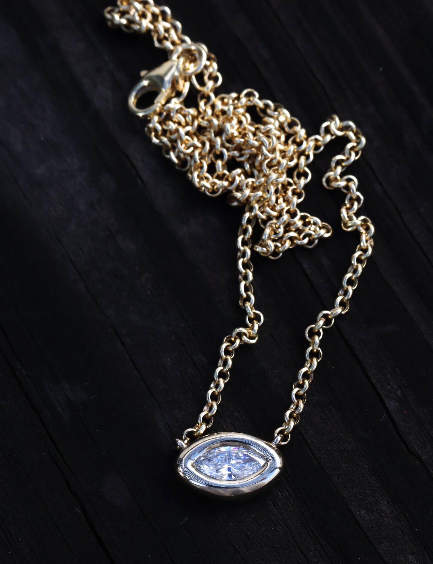 14kt gold baby marquise diamond puffed bezel necklace