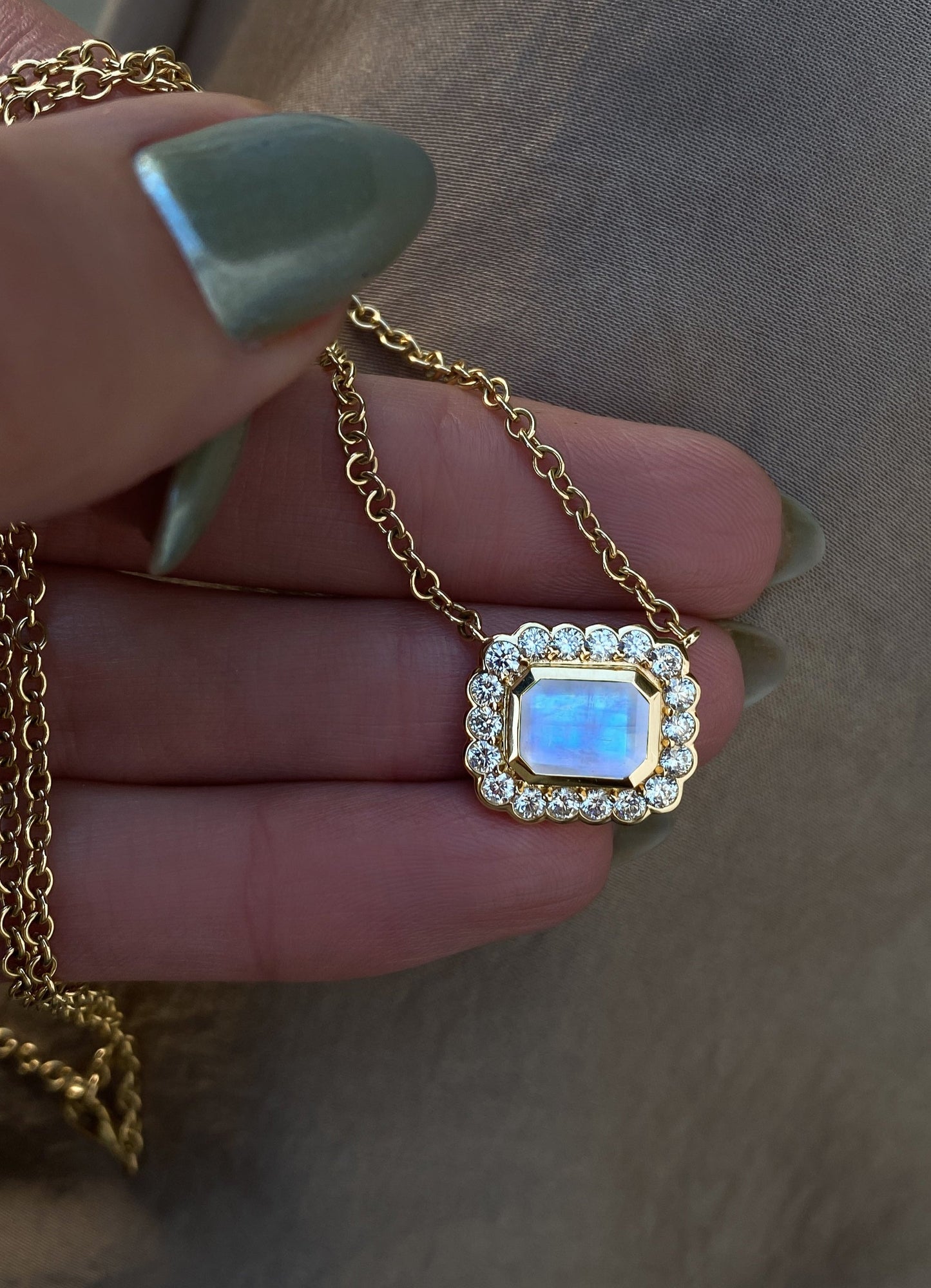 14kt gold and diamond grande emerald cut moonstone bezel burst necklace