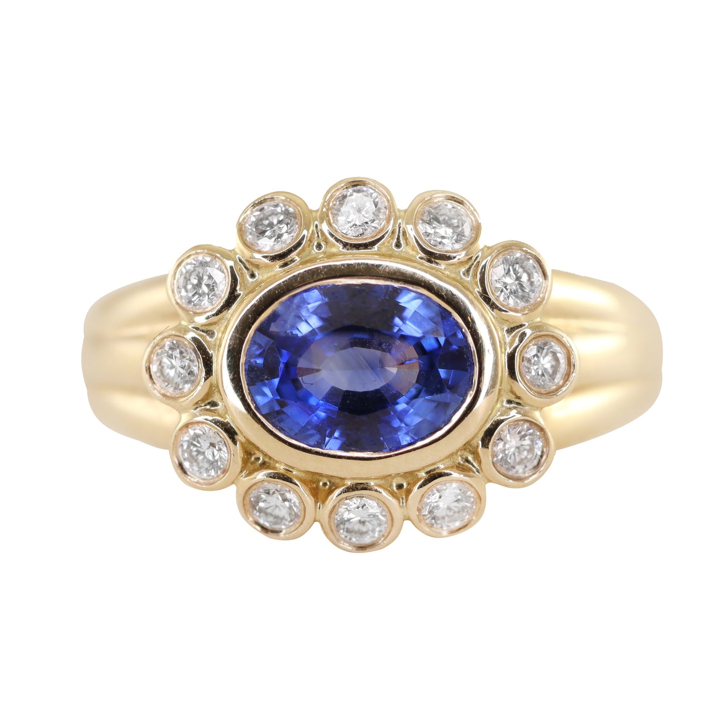 14kt gold and diamond blue sapphire bezel burst ring