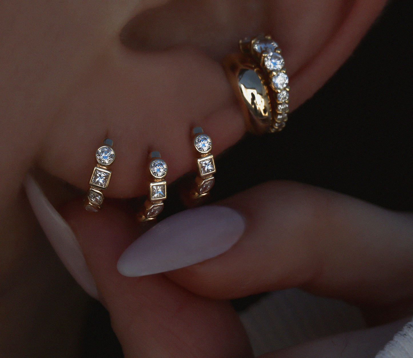 14kt gold mixed diamond cut bezel mini hoop