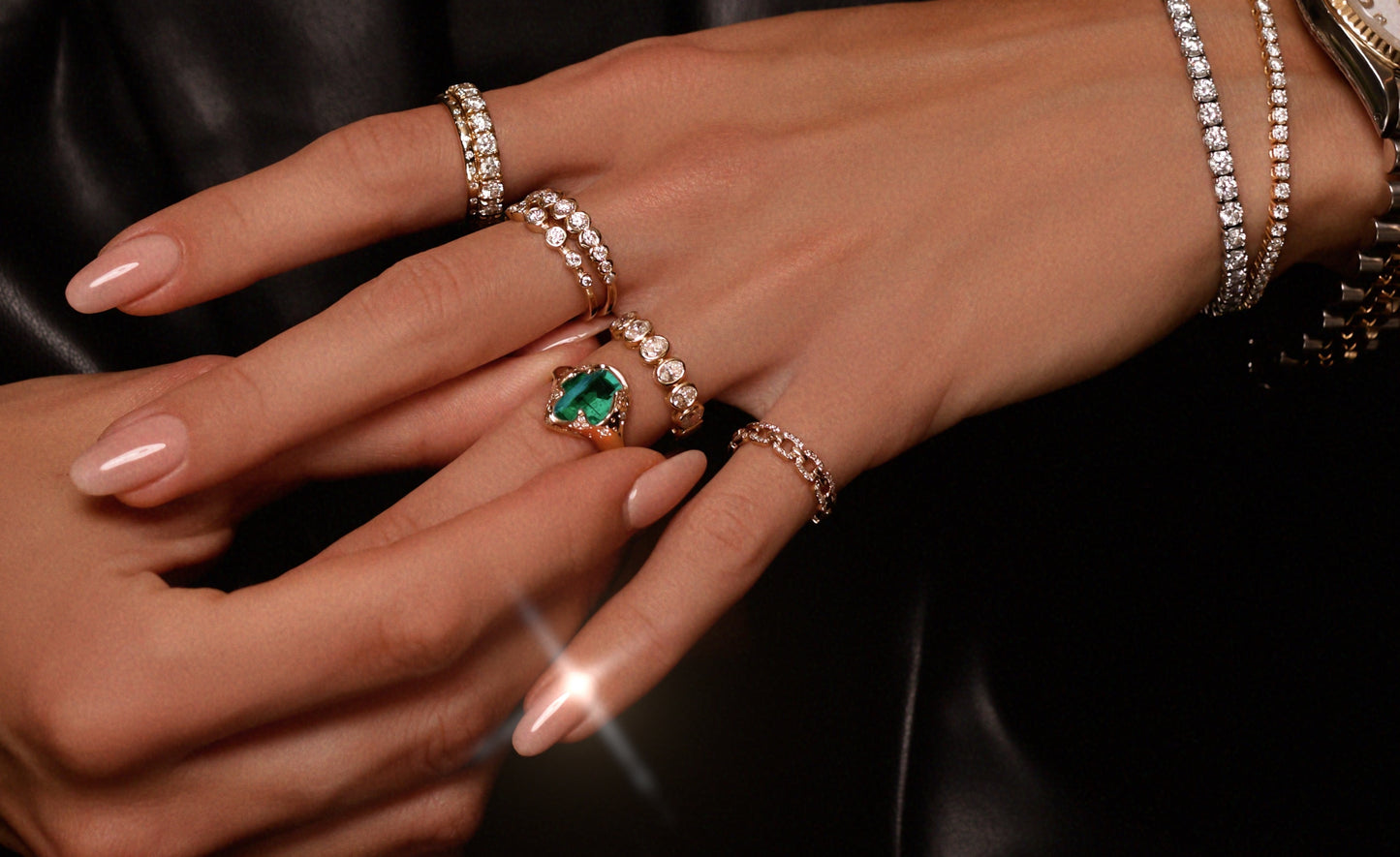14kt gold and diamond emerald claw ring