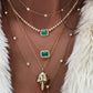 14kt gold and diamond emerald halo necklace