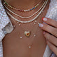 14kt gold rainbow sapphire heart bezel tennis necklace