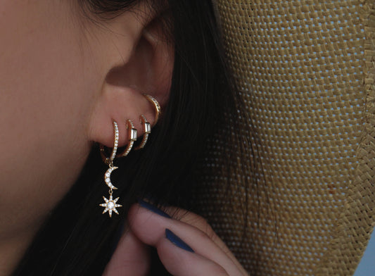 women's gold crescent moon earrings