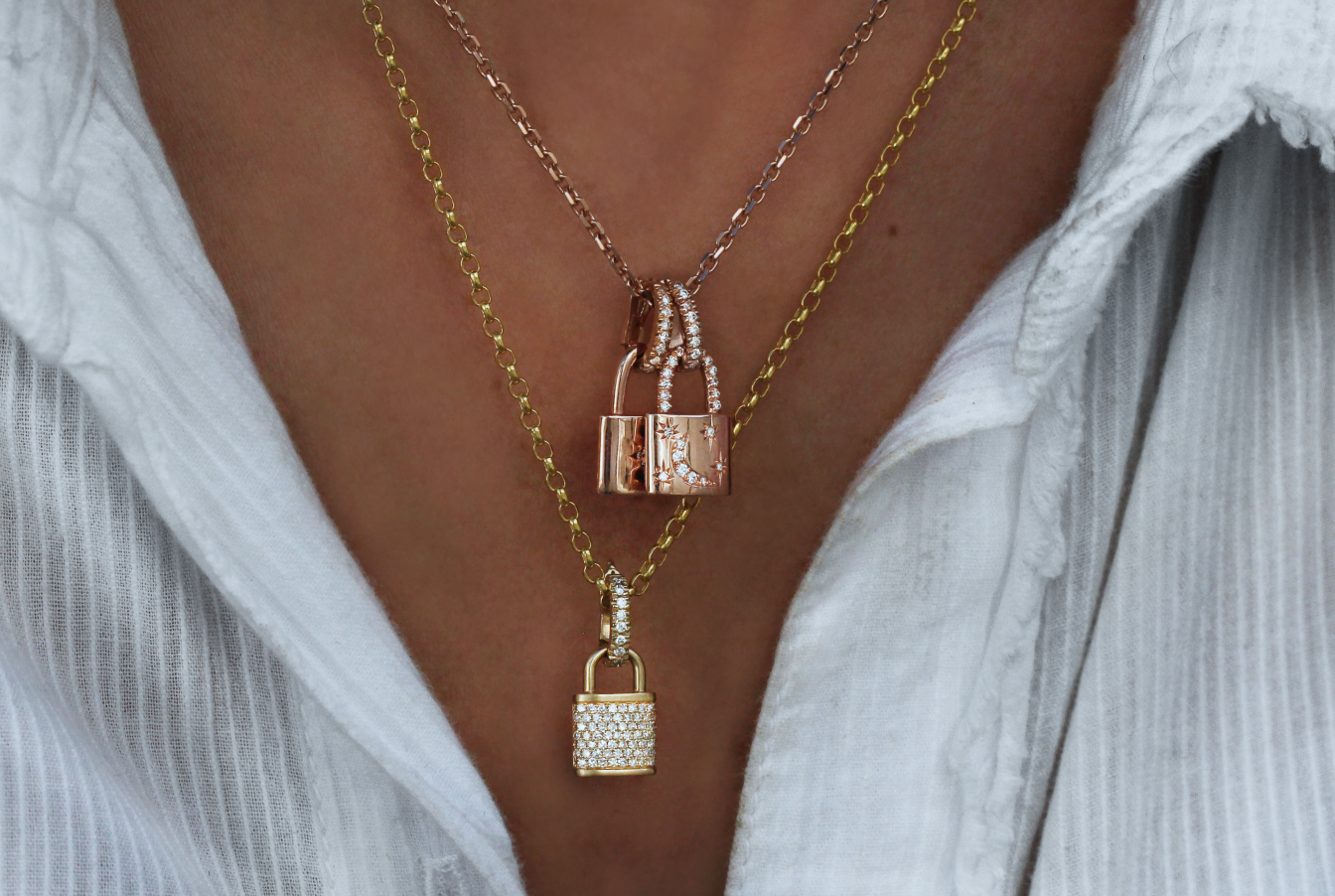 14kt gold and diamond crescent starburst lock necklace