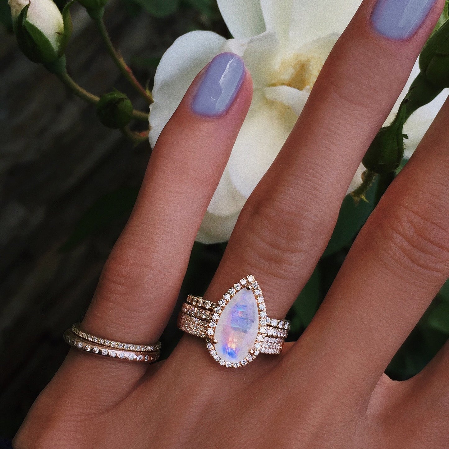 14kt gold and diamond elongated teardrop moonstone ring