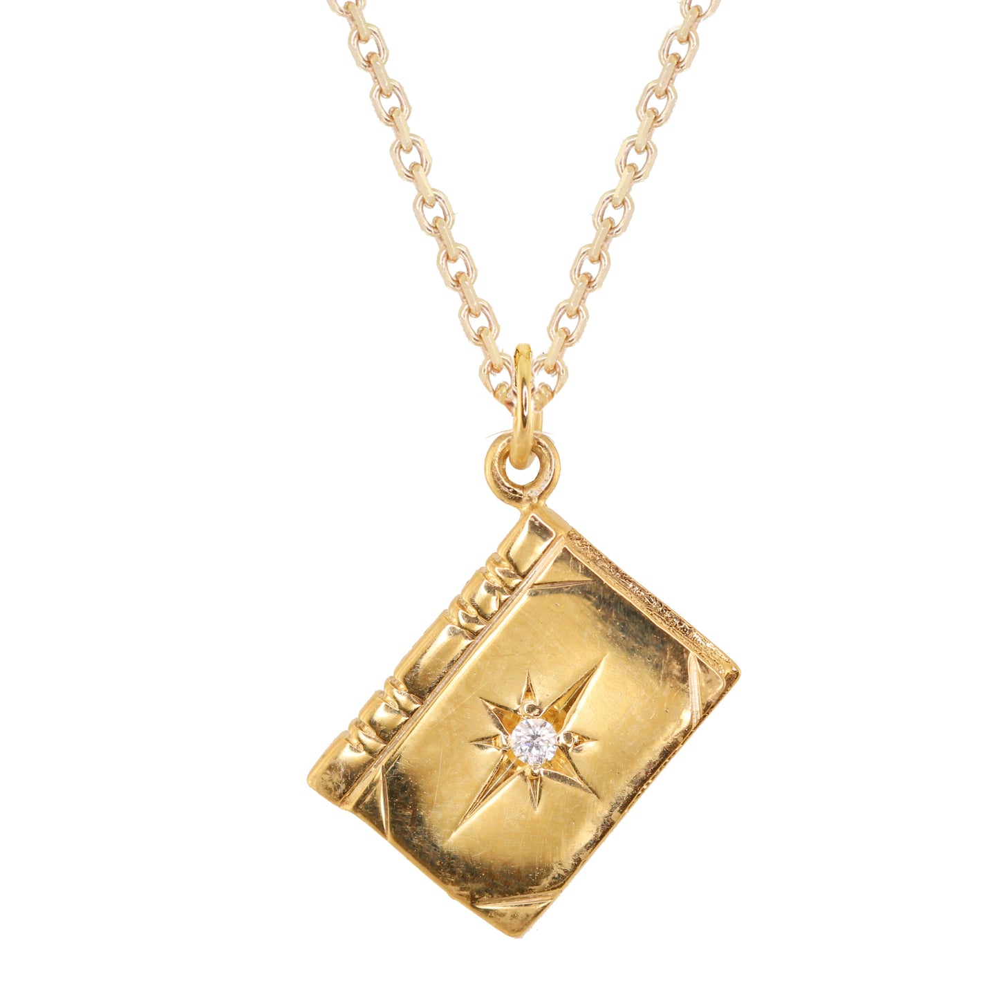 14kt gold and diamond starburst vintage book charm