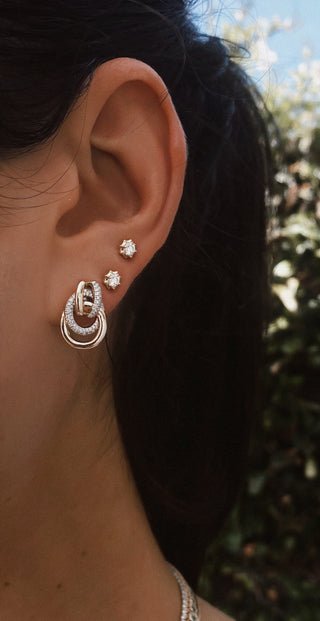 14kt gold and diamond knot stud