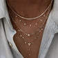 14kt gold single row diamond bezel drip lariat necklace
