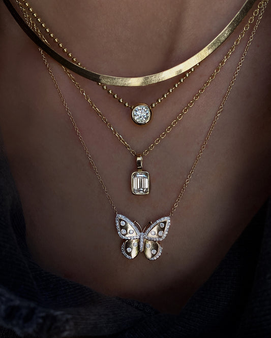 14kt gold and scattered diamond butterfly necklace