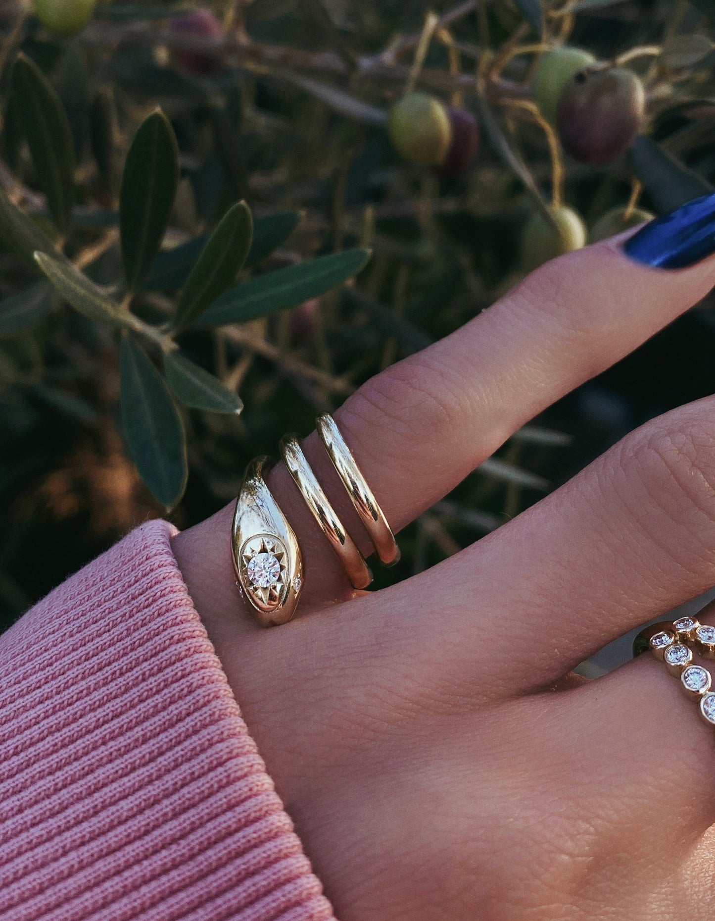 14kt gold and diamond coiled starburst snake ring
