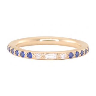 14kt gold baguette diamond and blue sapphire band