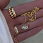14kt gold baby marquise diamond puffed bezel necklace