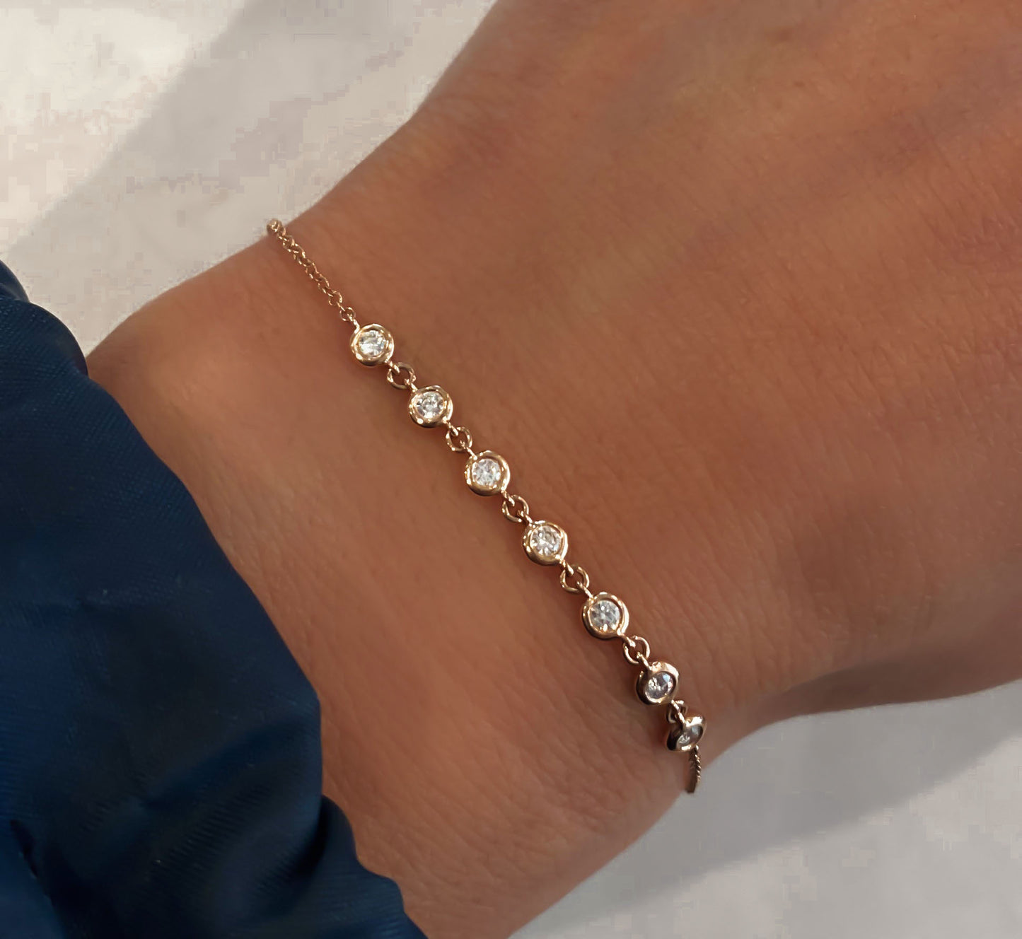 14kt gold seven diamond bezel bracelet