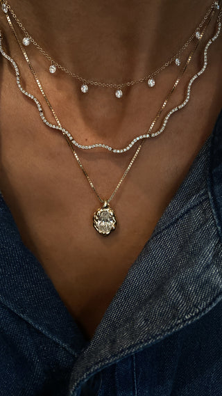 14kt gold molten diamond bezel necklace