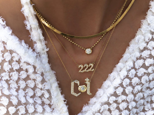 14kt gold round diamond donut bezel necklace on ball chain