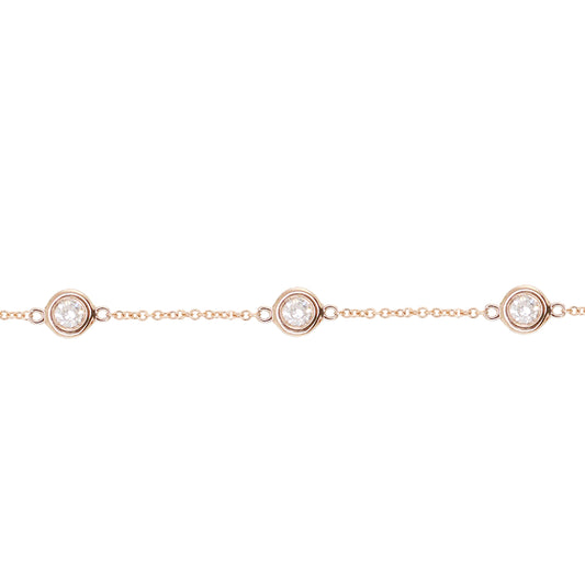 14kt gold three diamond bezel bracelet