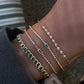 14kt gold emerald cut emerald bezel tennis bracelet
