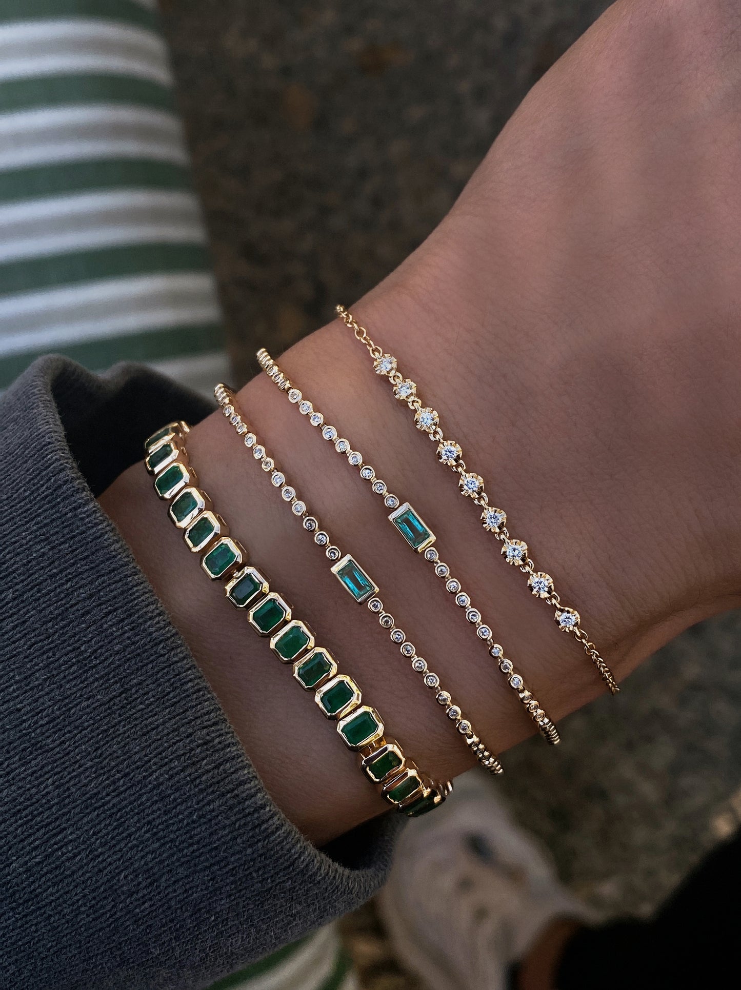 14kt gold emerald cut emerald bezel tennis bracelet