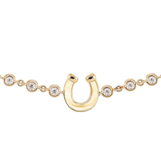 14kt gold diamond bezel horseshoe bracelet