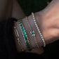 14kt gold emerald cut emerald bezel tennis bracelet