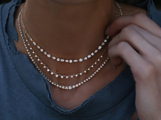 14kt gold graduated three prong diamond choker necklace