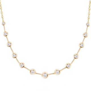 14kt gold graduated diamond orbit bezel necklace