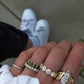 14kt gold emerald cut emerald bezel band