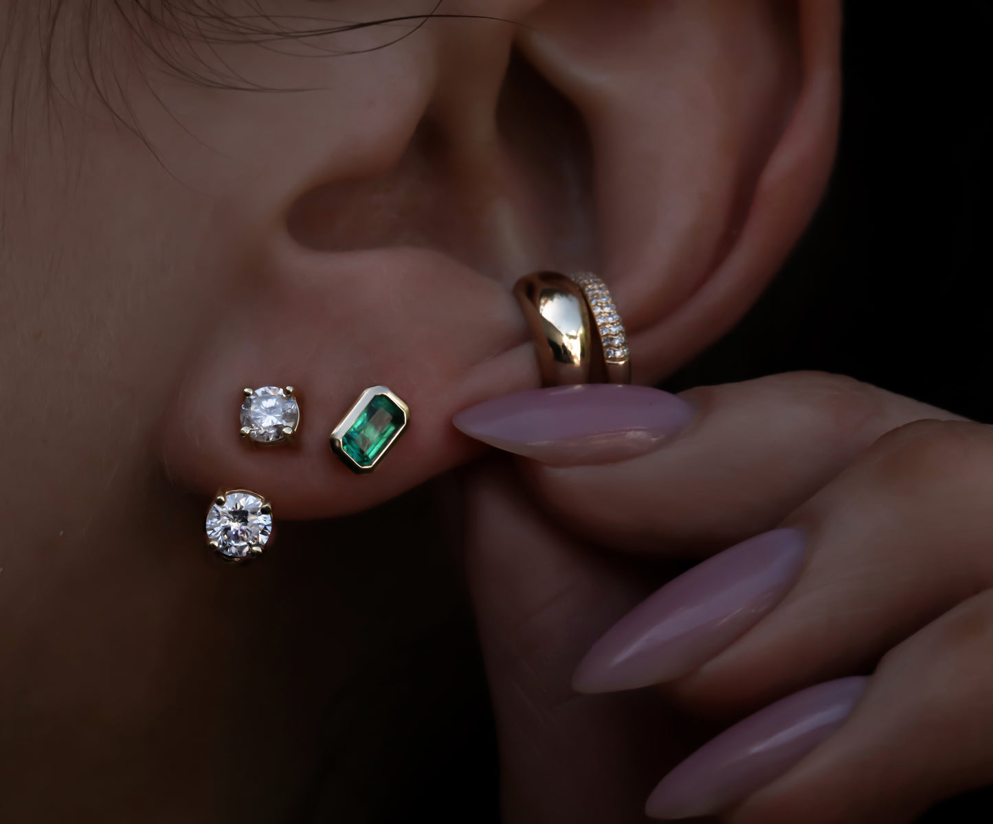 14kt gold floating two diamond stud