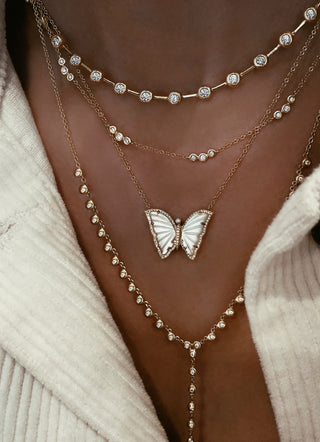 14kt gold and diamond white mother of pearl baby butterfly necklace