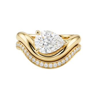 14kt gold solitaire teardrop diamond wave ring with diamond band
