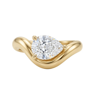 14kt gold solitaire teardrop diamond wave ring