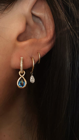 14kt gold and diamond teardrop blue topaz Marea hoop earring