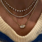 14kt gold graduated three prong diamond choker necklace