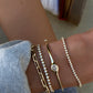 14kt gold diamond baby poppy tennis bracelet