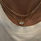 14kt gold two step marquise diamond bezel necklace