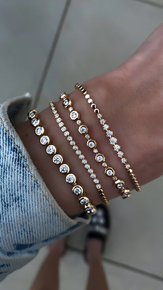 14kt gold large diamond bezel tennis bracelet