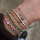 14kt gold teardrop emerald tennis bracelet