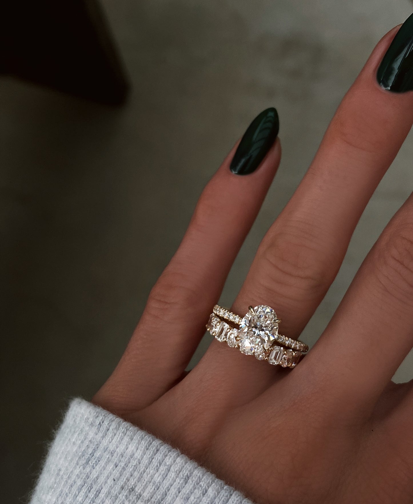 14kt gold mixed oval emerald diamond half eternity band