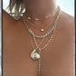 14kt gold diamond spiral shell necklace