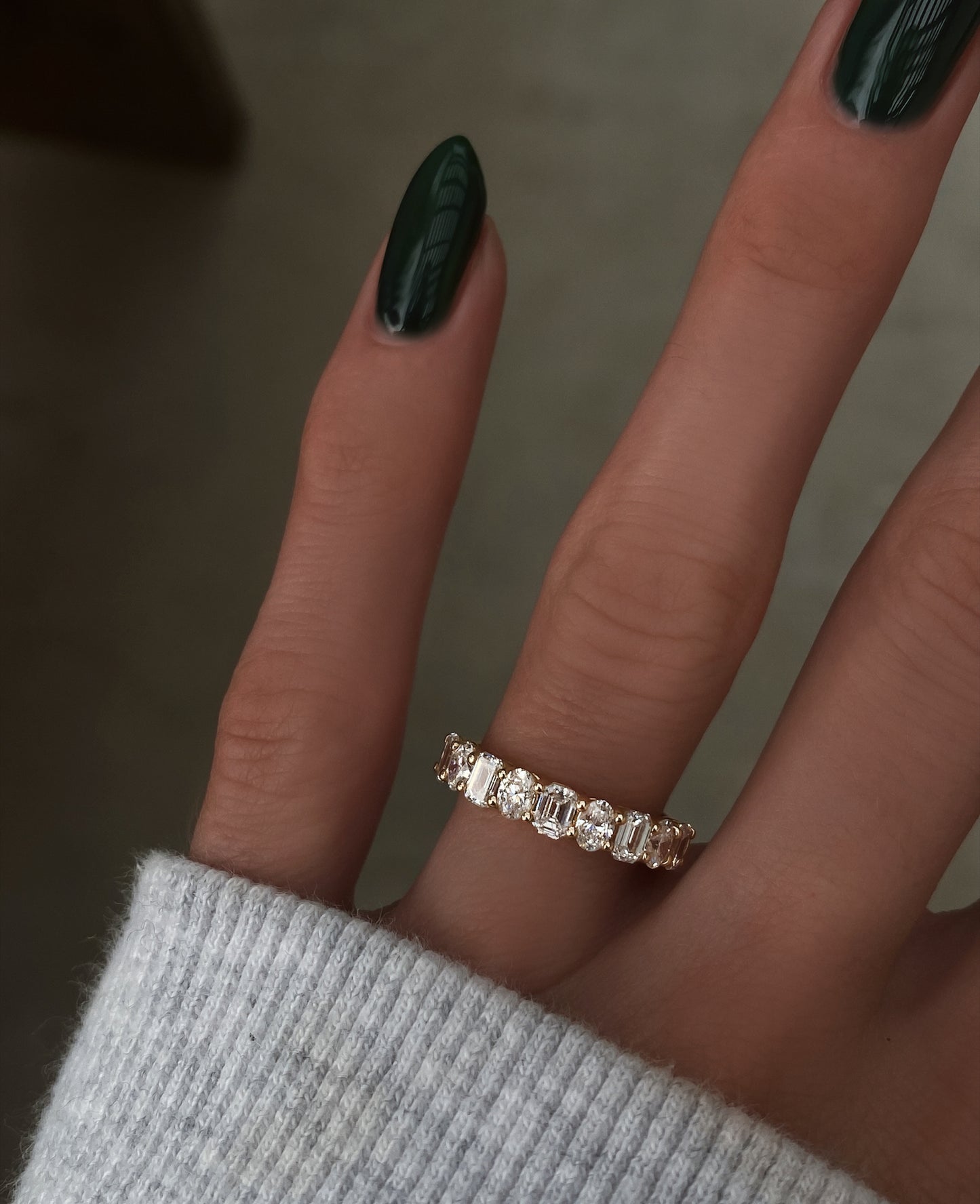 14kt gold mixed oval emerald diamond half eternity band