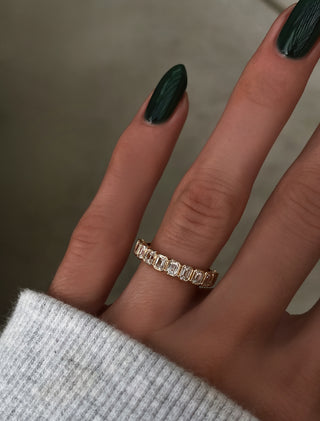 14kt gold petite emerald cut diamond bezel band