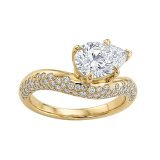 14kt gold solitaire teardrop diamond scattered wave ring