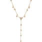 14kt gold single row diamond bezel drip lariat necklace